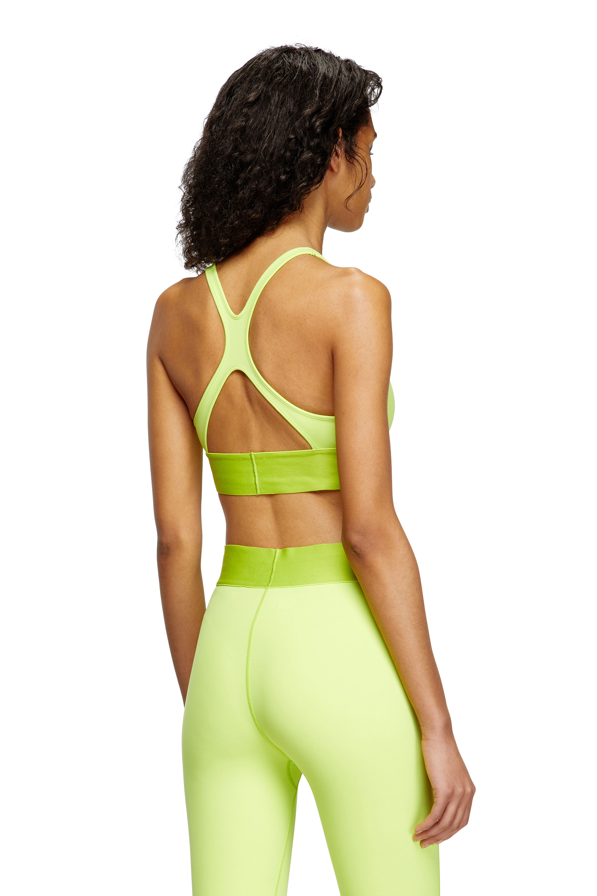 Diesel - ALLISON-D-POP, Reggiseno sportivo con logo tagliato Donna in Verde - 3