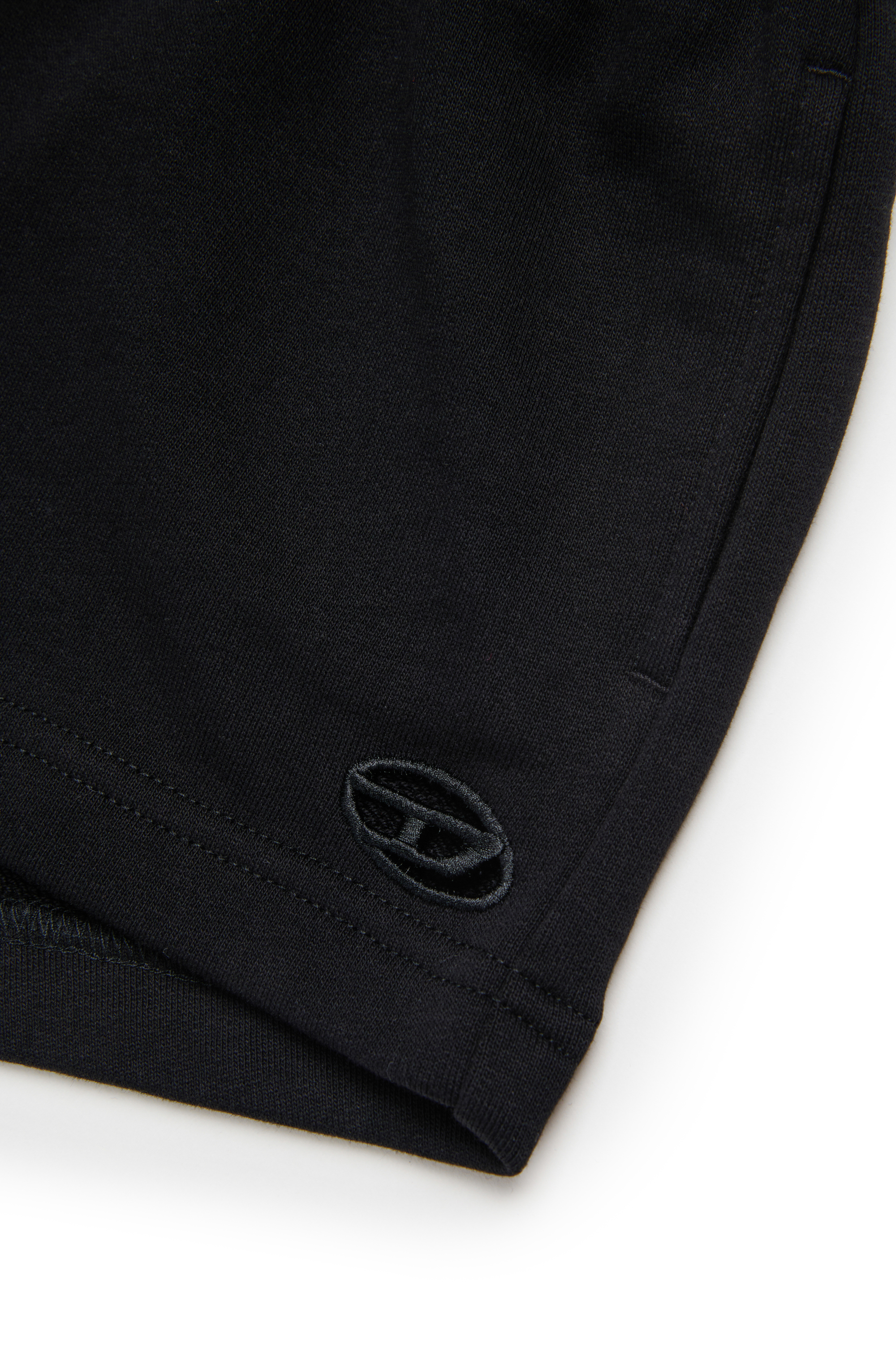 Diesel - PAGL, Shorts sportivi con logo Oval D cut-out Donna in Nero - 4